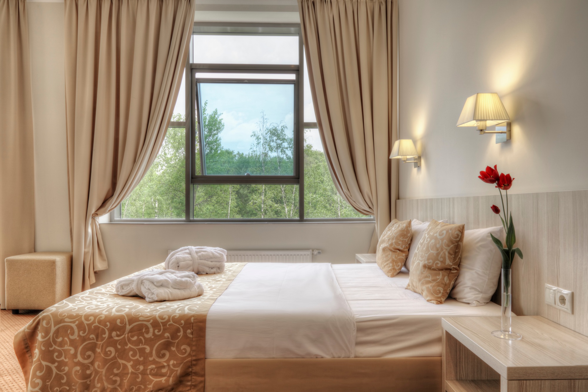 54090-bed-and-curtains-in-hotel-room.jpg